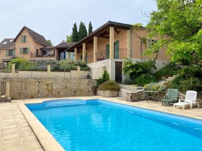 Spacious village house with heated swimming pool and garden