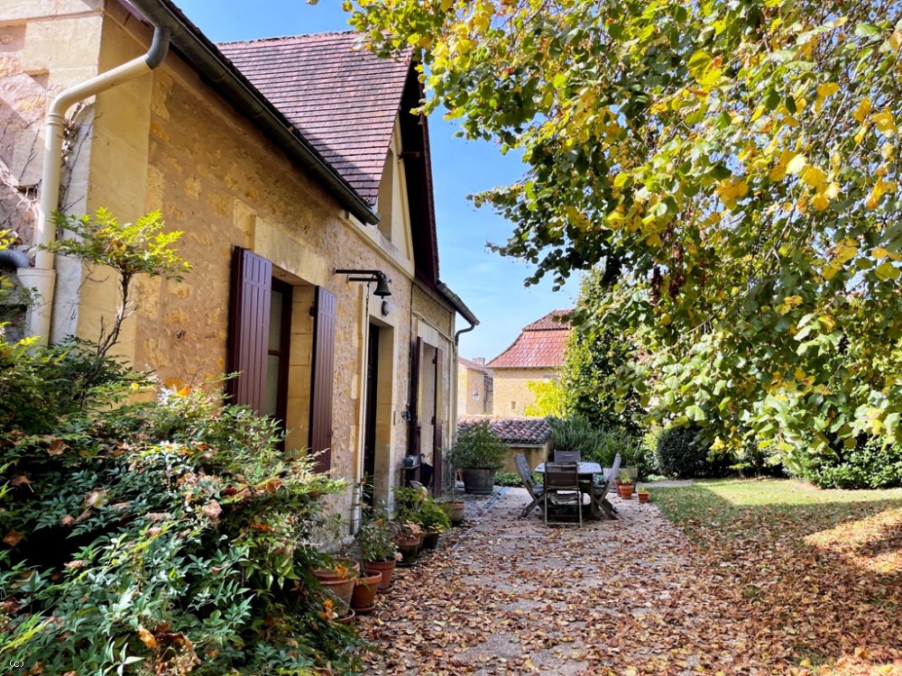 Attractive late 19th century village house with garage and garden