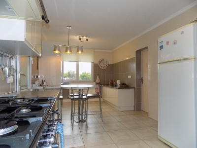 Immaculately presented 4 bedroom house with garage, heated swimming pool and garden