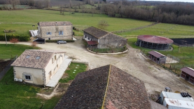 Restored farmhouse with 2 gites, extensive equestrian facilities, swimming pool and 23ha