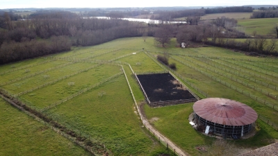 Restored farmhouse with 2 gites, extensive equestrian facilities, swimming pool and 23ha