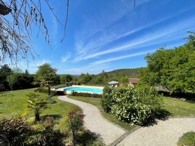 Attractive périgourdine style house with swimming pool and superb views