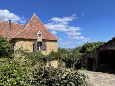 Attractive 18th century farmhouse with substantial outbuildings and garden