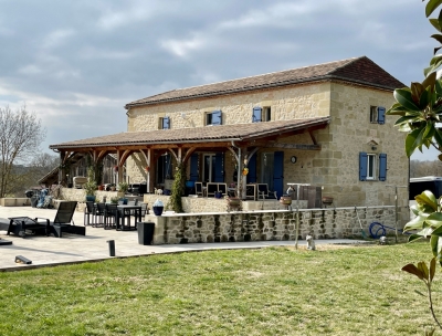 Restored farmhouse with 2 gites, swimming pool, extensive equestrian facilities and 23ha