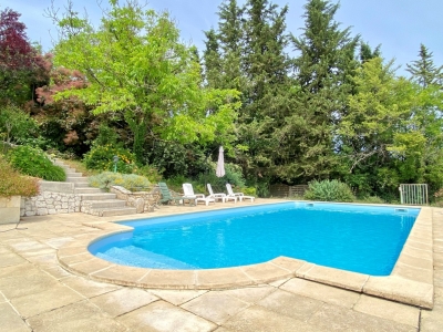 Spacious village house with heated swimming pool and garden